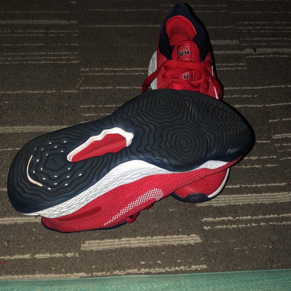 Nike basketball sneakers red size 7.5 men and 8.5 women